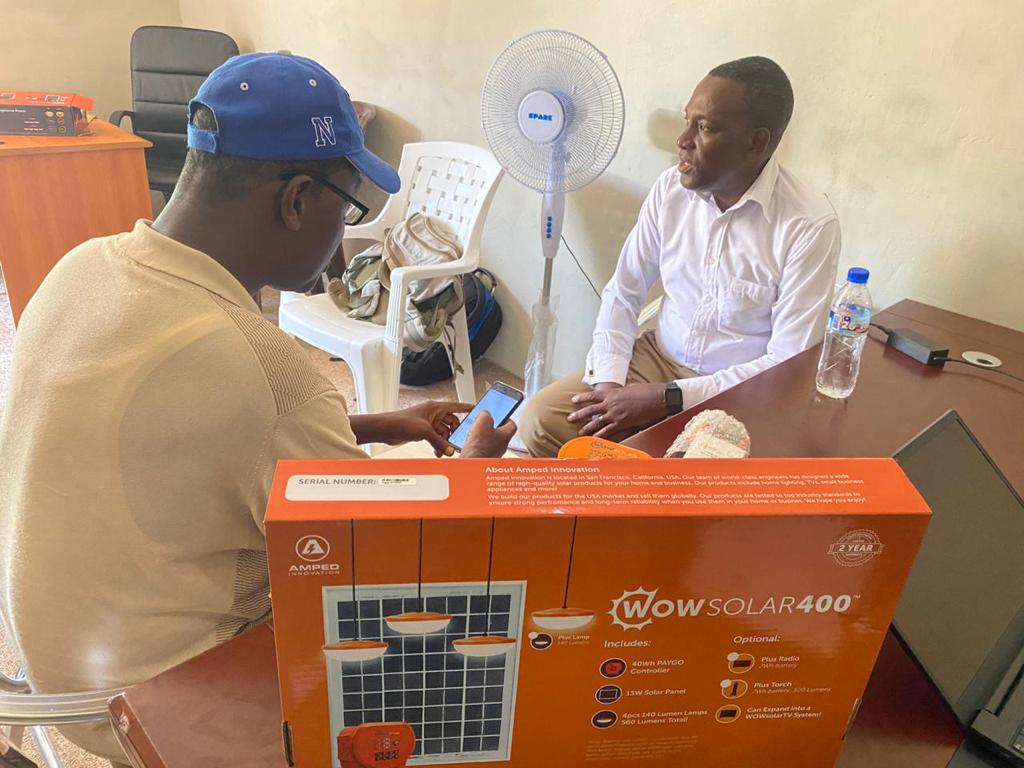 Board Chairman makes monthly payment for his Wow-Solar 400 kits to Payment Manager